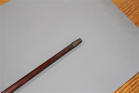 A walking stick, the ivory handle carved as a French bulldogs head with glass eyes, silver collar, London 1921, overall length 93.5cm